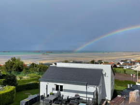 Plage du Débarquement. Maison bord de Mer